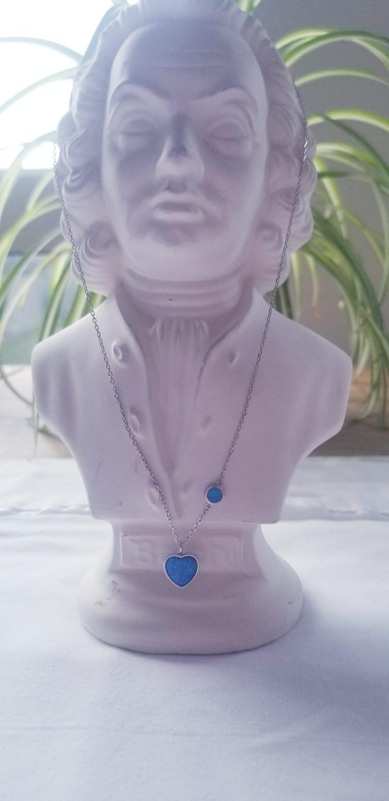 Necklace Emulated opal with heart and circle .jpg with sculpture